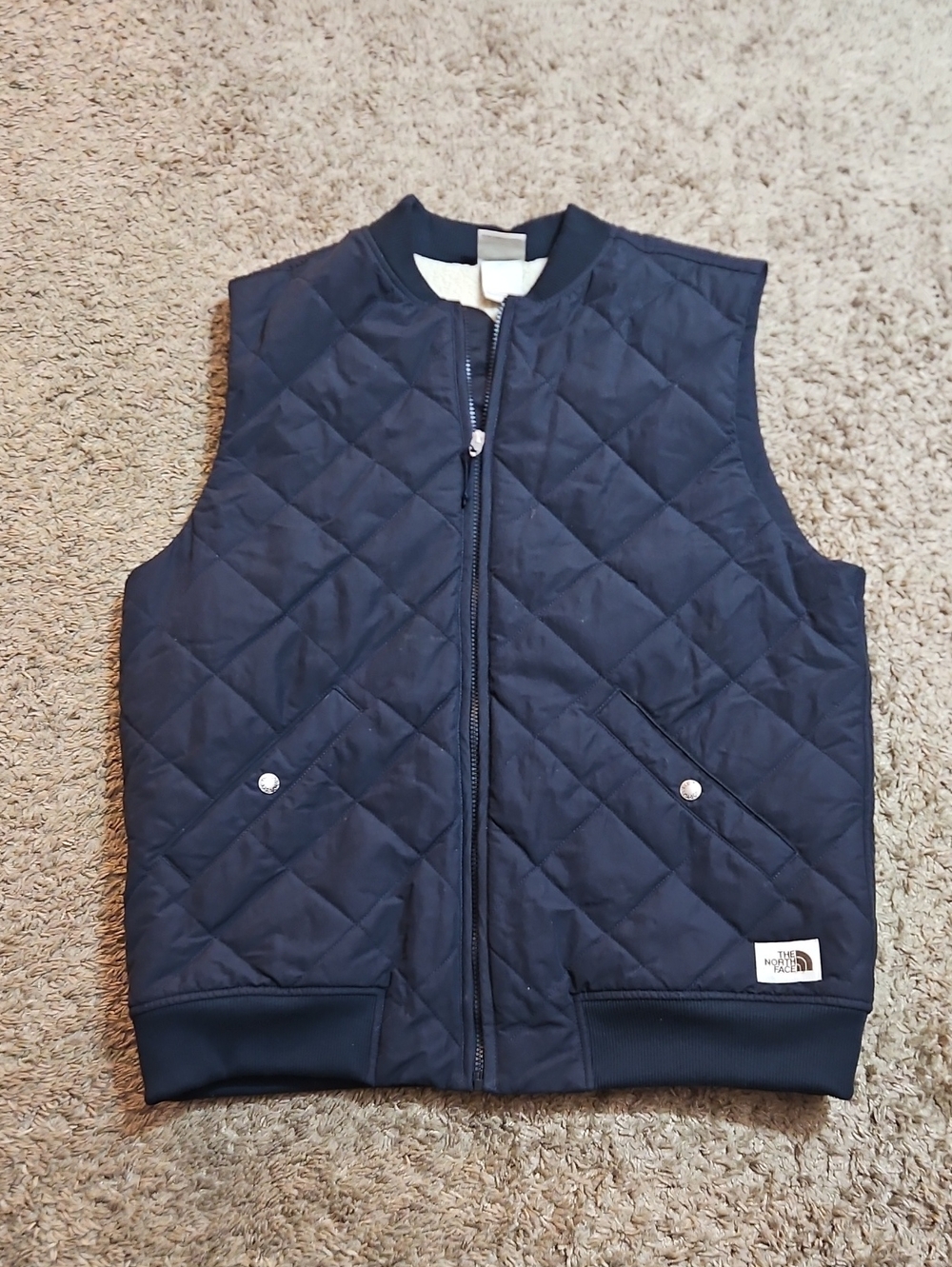 The North Face Navy Quilted Men's Vest with Snap Pockets